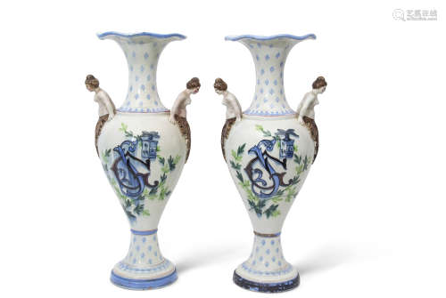 Pair of early 20th century Continental pottery vases, the tapered bodies with polychrome