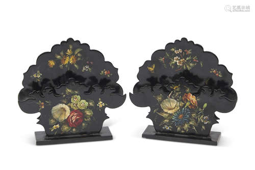 Pair of black lacquered floral decorated letter racks of shaped form, stamped 