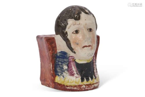 Unusual early 19th century Staffordshire plinth, the front modelled possibly as Napoleon, 10cm high