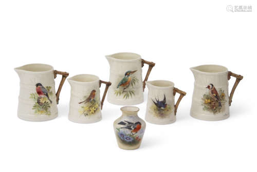 Set of five early 20th century Royal Worcester jugs all painted with birds by William Powell, the