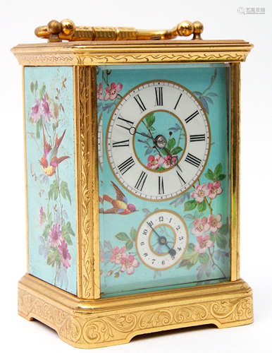 Last quarter of 19th/1st quarter of 20th century ornate brass and glass cased carriage clock