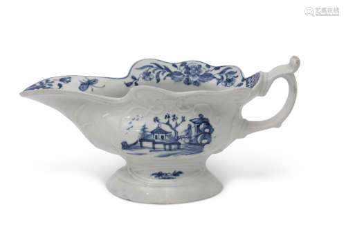 18th century Worcester high-footed sauce boat with scroll rim and moulded panels, painted to the