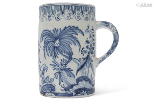 Large 18th/19th century Delft ware tankard, with an armorial design to centre bordered by floral