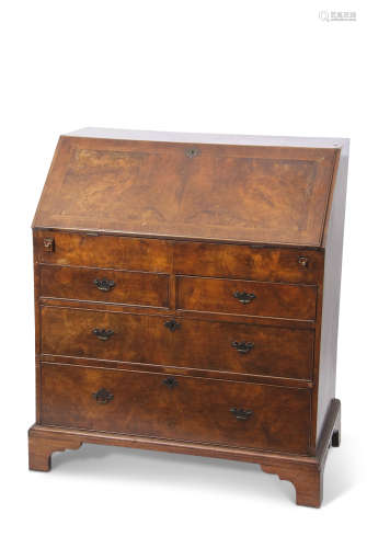Early 18th century walnut cross banded bureau of two short over two full width drawers with brass