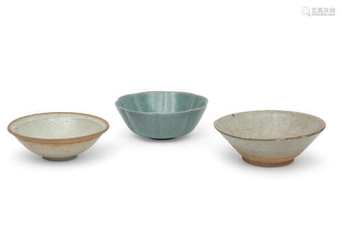 Group of three Chinese pottery bowls including a shaped Longquan celadon type bowl with crackle