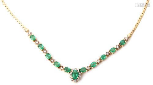 Emerald and diamond necklace set with eleven oval shaped Columbian emeralds, individually prong set,