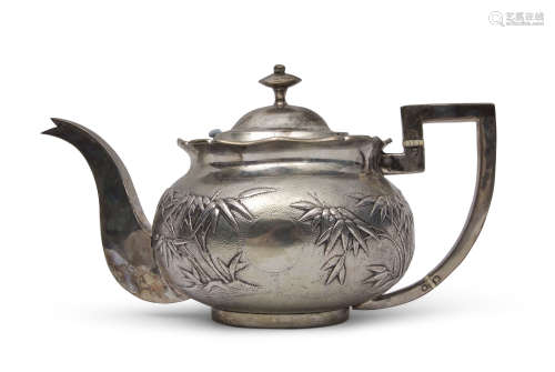 Late 19th century/early 20th century Chinese white metal tea pot embossed with bamboo designs to a