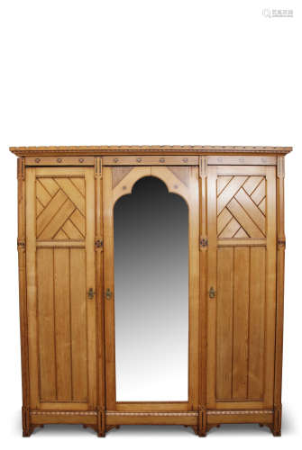 Late 19th century birch wardrobe in Arts & Crafts style by Edwards & Roberts, having a central
