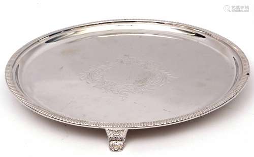 Late Victorian circular salver in George III style, having gadrooned rim, the centre with large