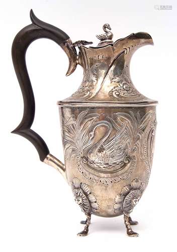 Edward VII Irish hot water jug of vase shape with card cut rim, heavily embossed with swans,