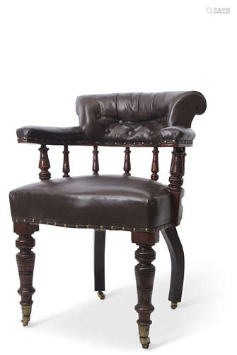 Late 19th century mahogany framed desk tub chair, upholstered in brown leather button back raised on