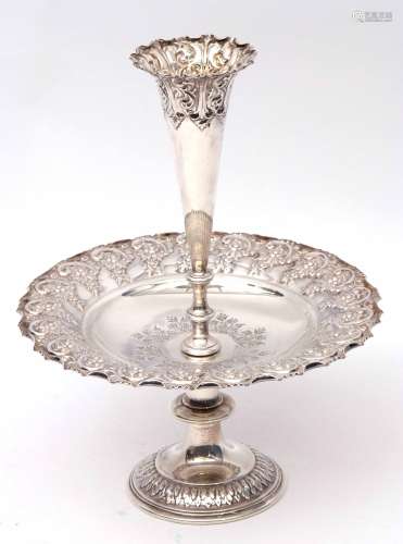 Edward VII pedestal epergne/fruit dish of circular form, the dish heavily embossed with scroll and