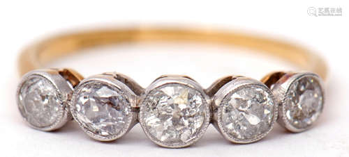 Five stone diamond ring featuring five old cut diamonds, each in millegrain settings and raised in a