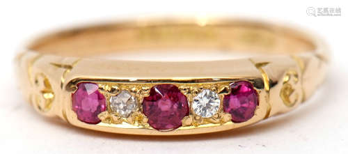 18ct gold ruby and diamond ring, alternate set with three graduated circular cut rubies and two