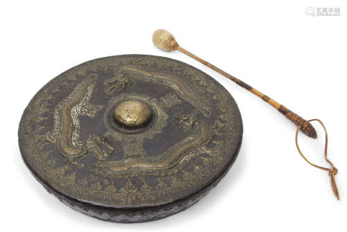 18th/19th century Sino-Tibetan temple gong, the bronzed body decorated in relief with three