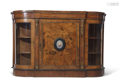 19th century walnut credenza with satinwood inlay and decorative brass mounts, fitted centrally with