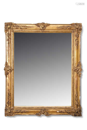 19th century gilt and gesso rectangular wall mirror with floral encrusted corners and a moulded
