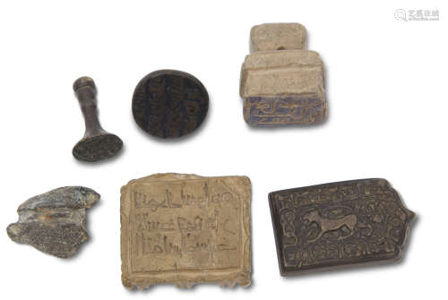 Group of Seljuk seals and intaglios, Persian, probably 11th/12th century, including two bronze