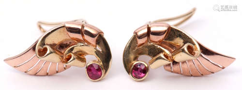 Pair of Art Deco style yellow metal clip-on ruby cocktail earrings, a stylised wing design, each