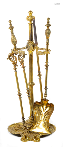 A Set of French Gilt Bronze Fireplace Tools Height…