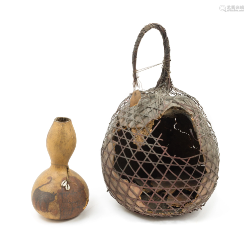 An African Gourd Basket Height 22 1/2 inches.