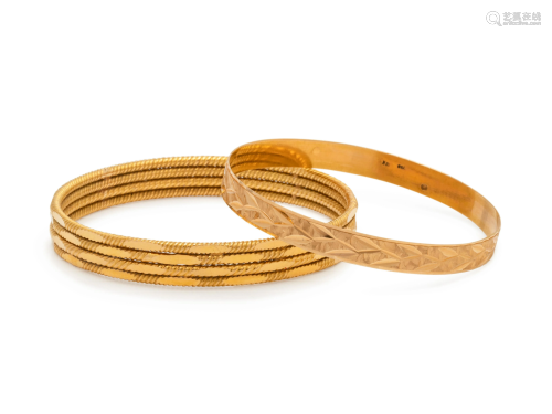 COLLECTION OF YELLOW GOLD BANGLE BRA…