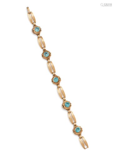 YELLOW GOLD AND BLUE ZIRCON BRACELET