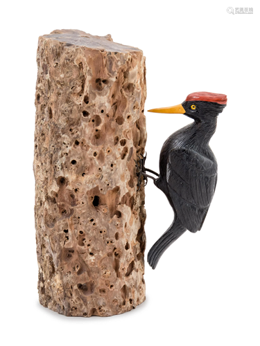 A Carved Tiger Eye Figure of a Woodpecker