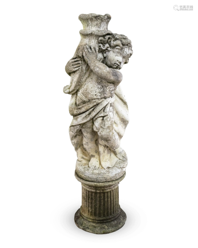 A Cast Stone Figure of a Putto Holding a Cornucopia