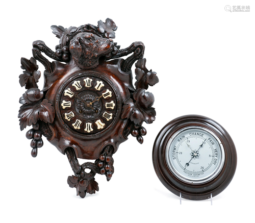 A Black Forest Carved Wall Clock