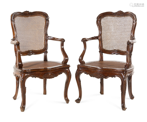 A Pair of Louis XV Style Walnut Fauteuils