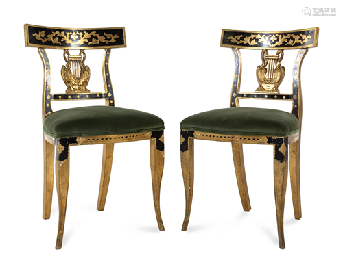 A Pair of Italian Parcel Ebonized and Giltwood Side