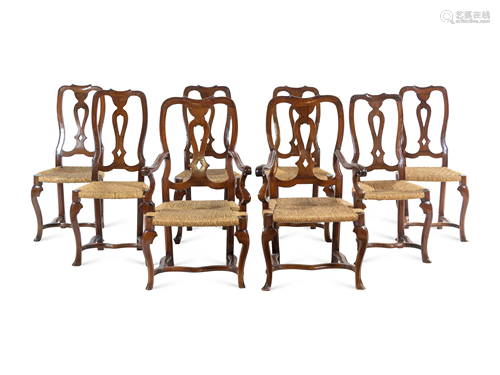 A Set of Eight Italian Walnut Rush-Seat Dining Chairs