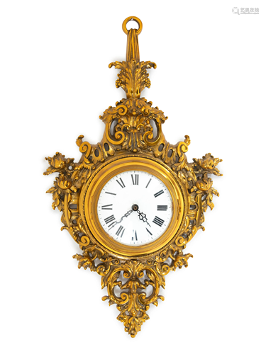 A Louis XV Style Brass Cartel Clock