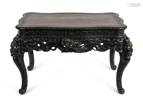 A Chinese Carved and Ebonized Wood Center Table …