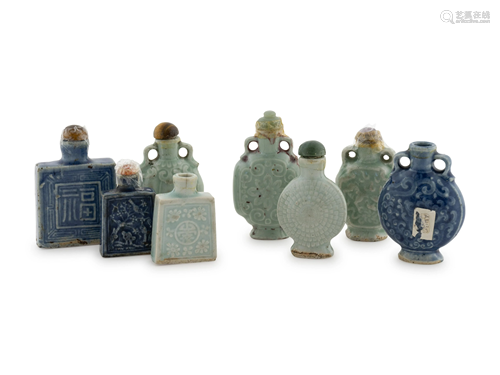 A Group of Eight Porcelain Snuff Bottles Height of