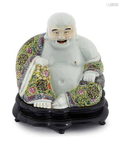 A Chinese Porcelain Seated Buddha