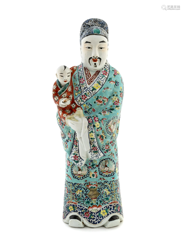 A Chinese Famille Rose Figure of a Scholar and a Child