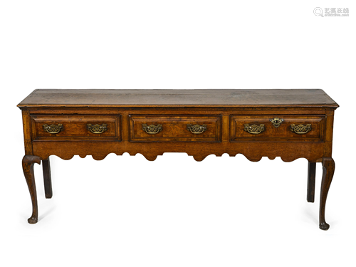 A Provinical George III Oak Sideboard