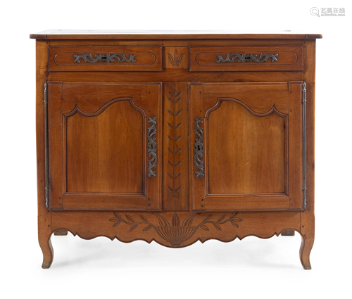 A Louis XV Provincial Walnut Cabinet