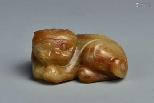 A CREAMY WHITE AND RUSSET JADE PIXIU QING DYNASTY