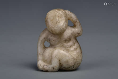 A WHITE AND RUSSET JADE MONKEY MING DYNASTY