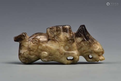 A CREAMY WHITE AND RUSSET JADE BEAST 10TH CENTURY AND EARLIER