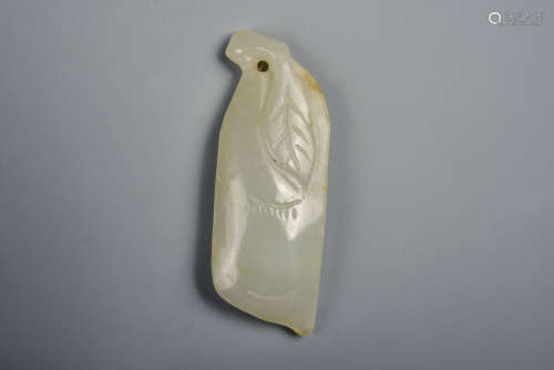 A WHITE AND RUSSET JADE MELLON QING DYNASTY