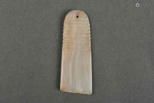 A WHITE JADE PLECTRUM MING DYNASTY