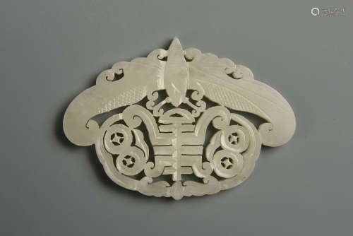 A RETICULATED WHITE JADE ORNAMENT QING DYNASTY