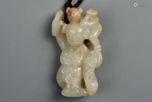 A WHITE AND RUSSET JADE STANDING FIGURE MING DYNASTY