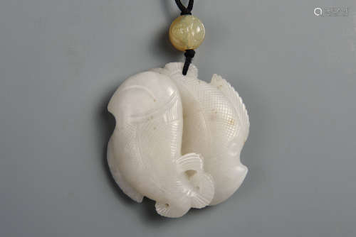 A CARVED WHITE JADE DOUBLE CARPS QING DYNASTY