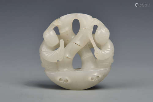 A CARVED WHITE JADE ORNAMENT