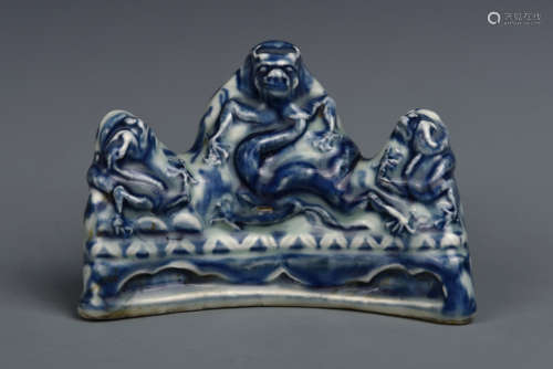 A BLUE AND WHITE BRUSH-REST MING DYNASTY